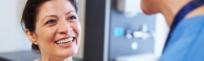 Picture of woman with a health and care professional